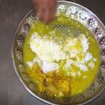 Mid day meal of children is being served mad mixed dal