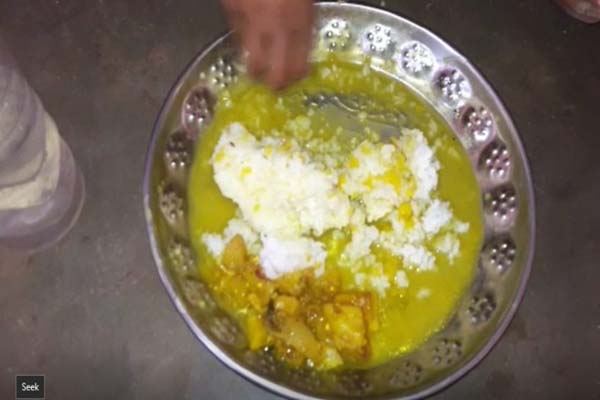 Mid day meal of children is being served mad mixed dal